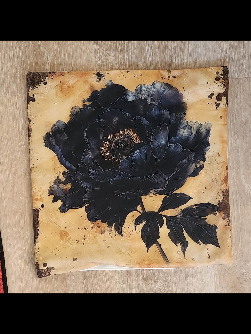 Black Floral Accent Pillow Case on Antique Gold Background